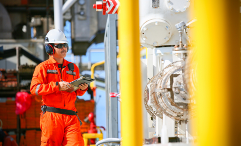 dangerous goods crew member taking readings.png